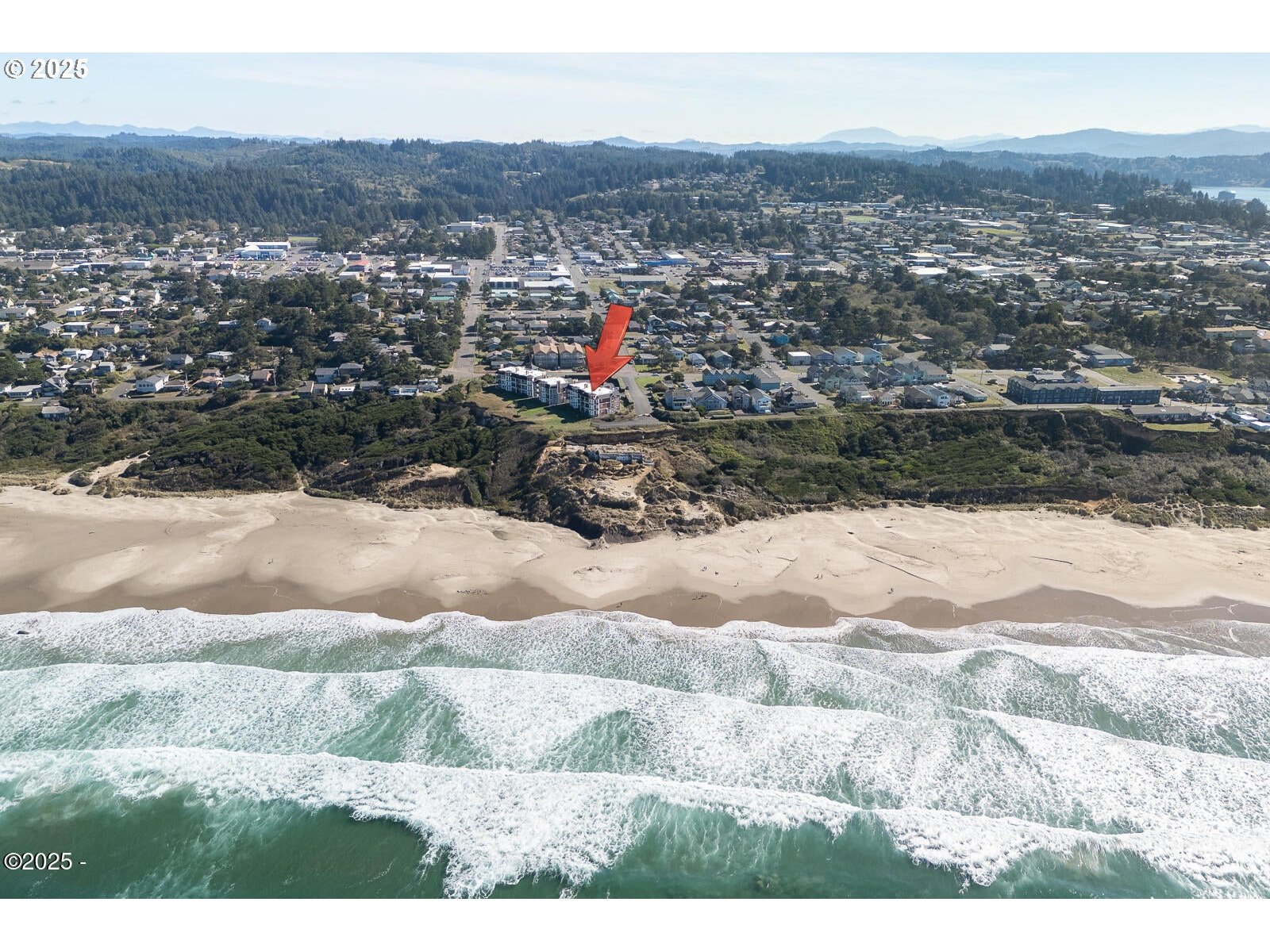 1125 Northwest Spring Street, Unit A302 Newport, OR 97365 - Photo 31 of 31 a view of city and mountain