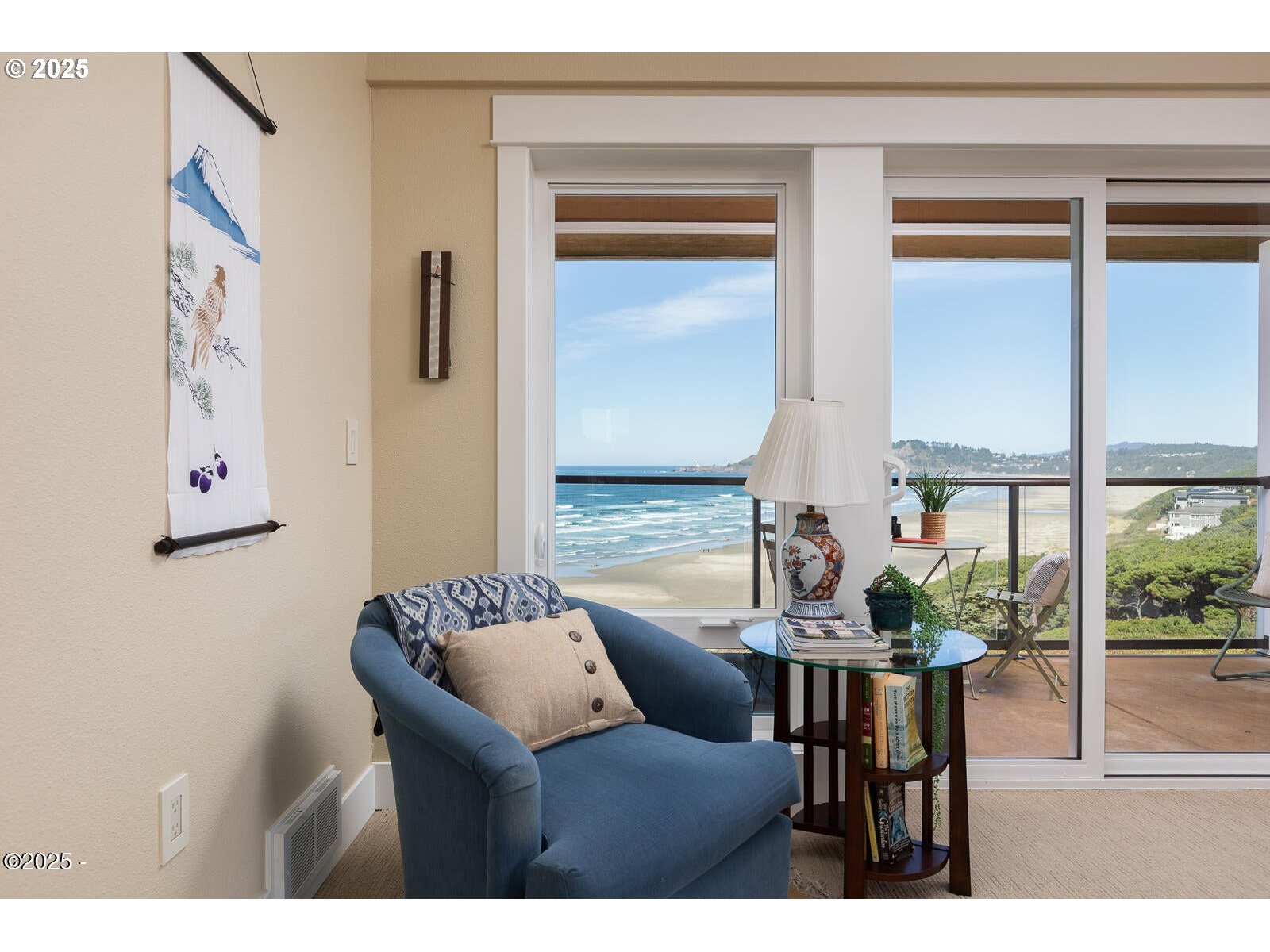 1125 Northwest Spring Street, Unit A302 Newport, OR 97365 - Photo 7 of 31 a view of a dining room with furniture window and outside view
