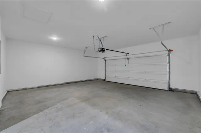 a view of room with window and entryway