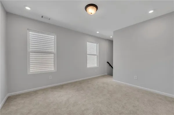 an empty room with windows