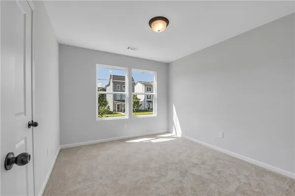 an empty room with windows