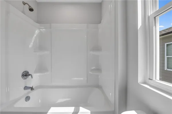 a bathroom with a bathtub