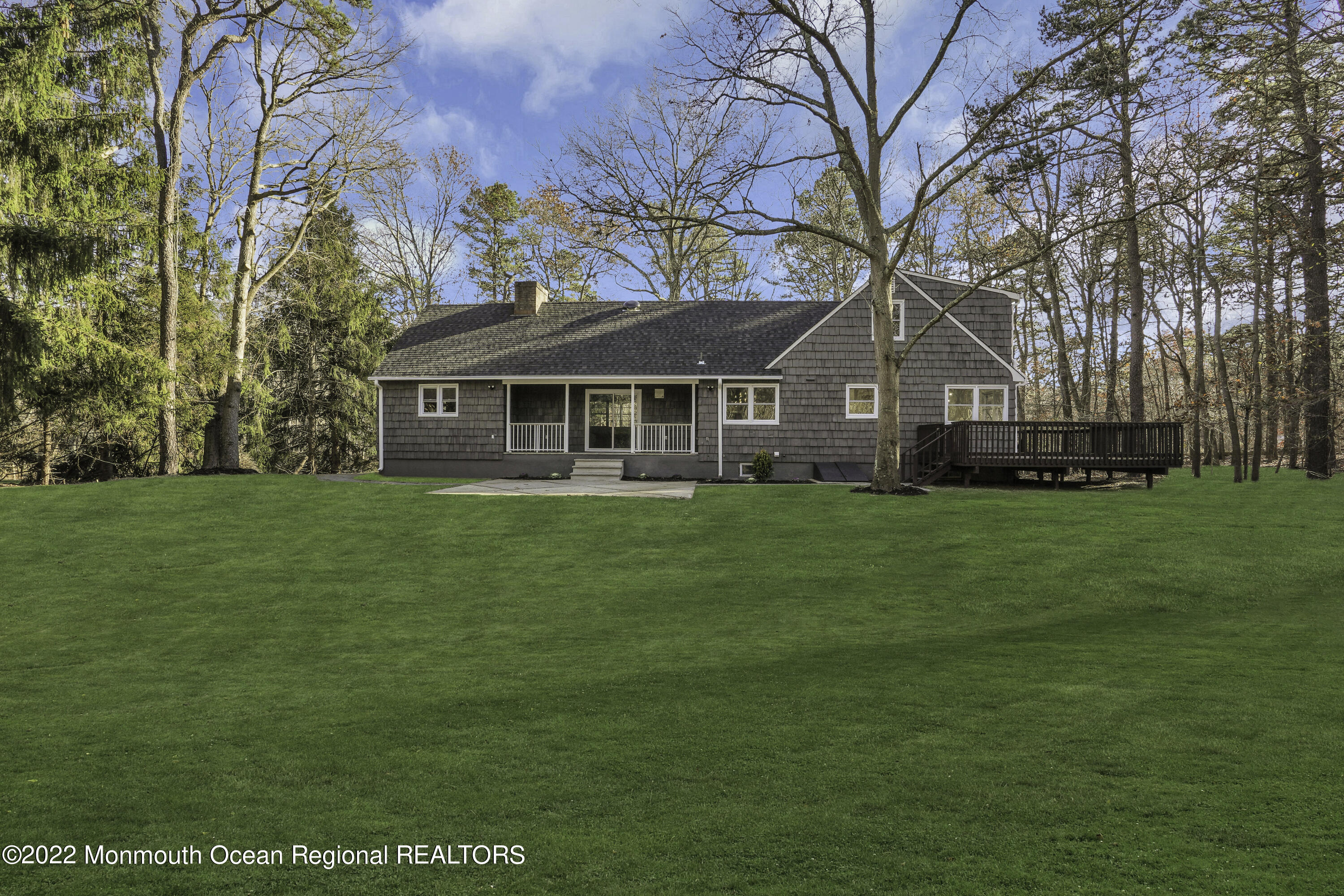614 Jackson Mills Road Jackson, NJ 08527 - Photo 3 of 64 a front view of a house with a garden