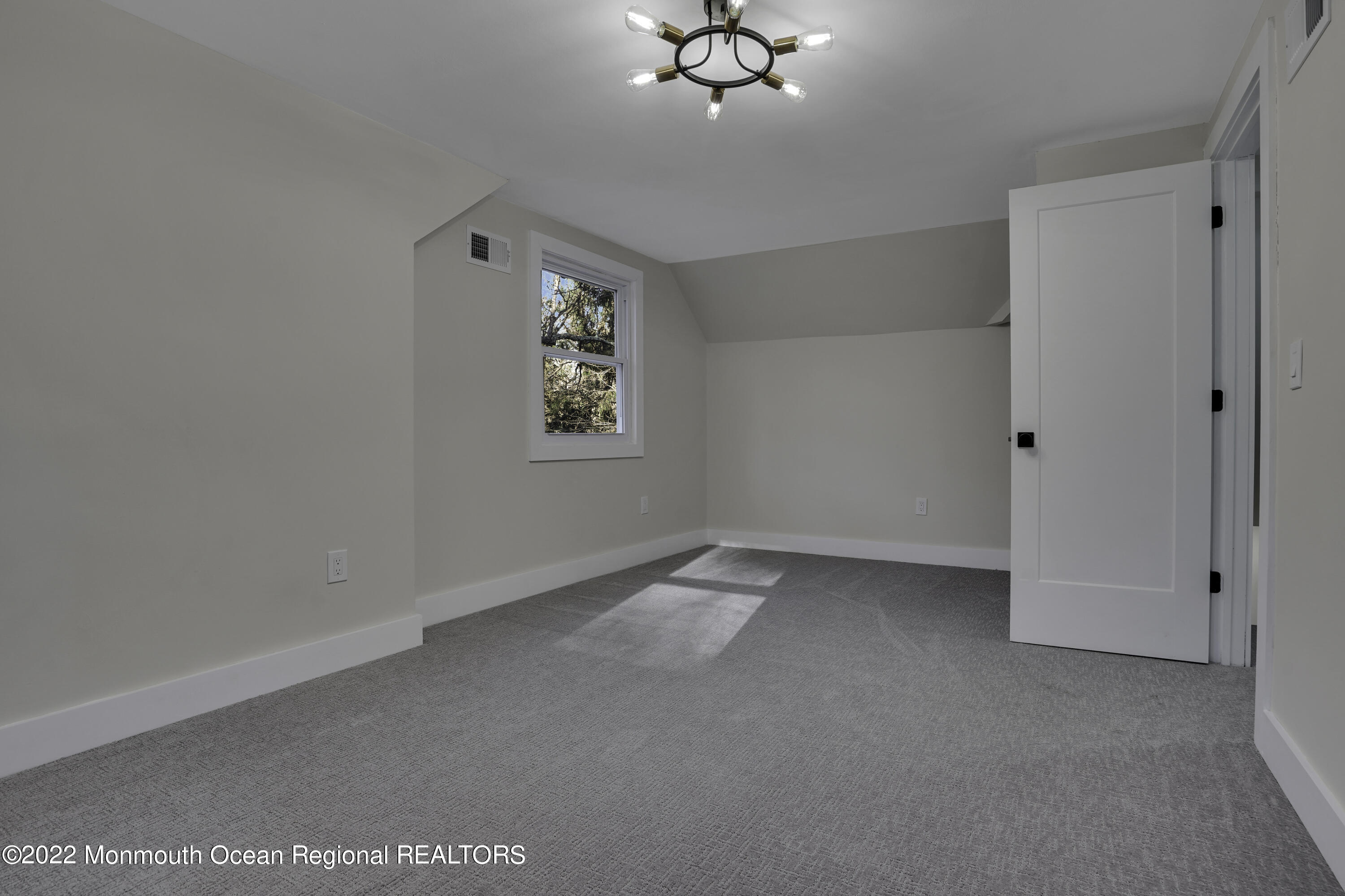 614 Jackson Mills Road Jackson, NJ 08527 - Photo 37 of 64 a view of an empty room with a window