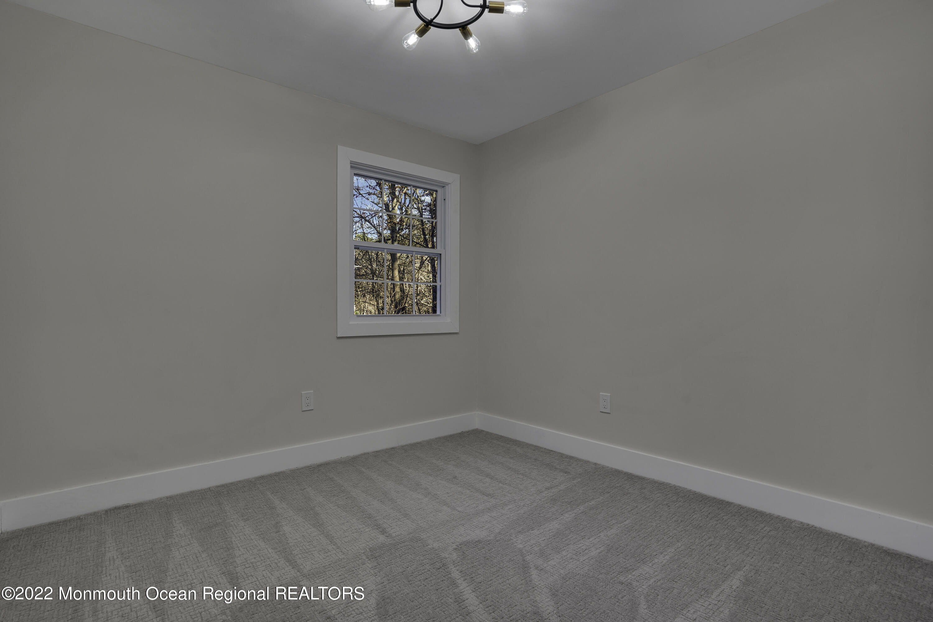 614 Jackson Mills Road Jackson, NJ 08527 - Photo 43 of 64 an empty room with a window