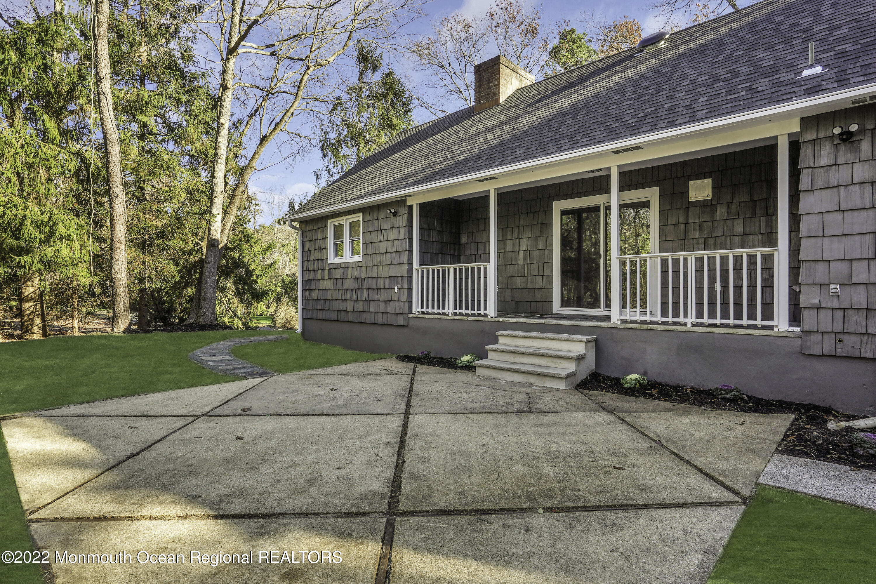 614 Jackson Mills Road Jackson, NJ 08527 - Photo 54 of 64 a front view of a house with garden