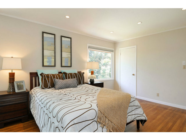 6 Spring Valley Lane Millbrae, CA 94030 - Photo 11 of 25 a bedroom with a bed and a night stand