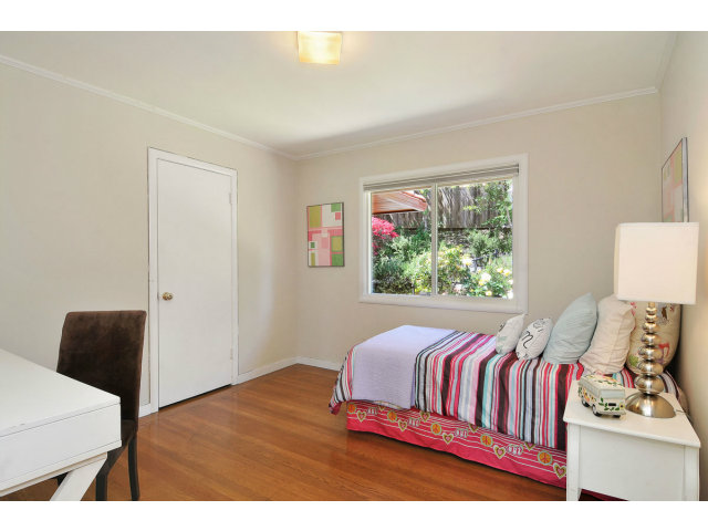 6 Spring Valley Lane Millbrae, CA 94030 - Photo 12 of 25 a bedroom with a bed and a window
