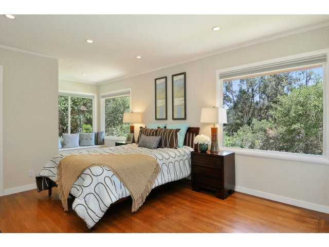 6 Spring Valley Lane Millbrae, CA 94030 - Photo 16 of 25 a bedroom with a bed and a large window