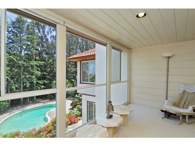 6 Spring Valley Lane Millbrae, CA 94030 - Photo 19 of 25 a view of a porch with furniture and yard
