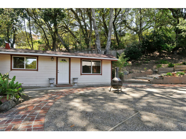 6 Spring Valley Lane Millbrae, CA 94030 - Photo 23 of 25 a backyard of a house with garden and trees