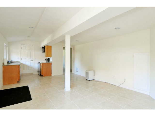 6 Spring Valley Lane Millbrae, CA 94030 - Photo 24 of 25 a living room with furniture and kitchen view