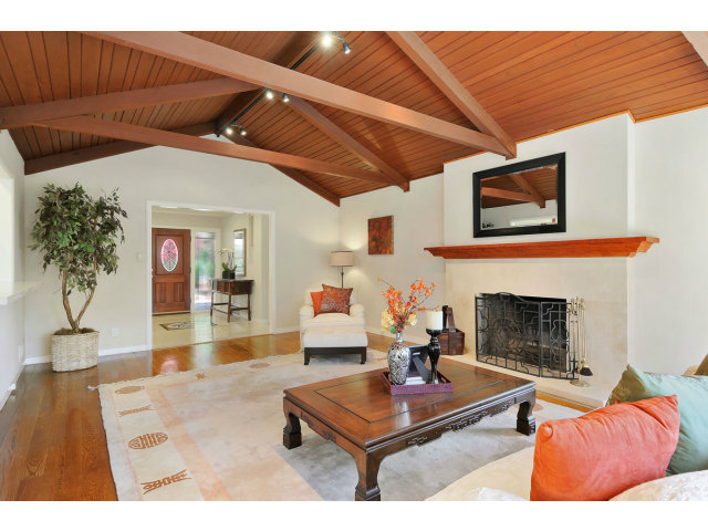 6 Spring Valley Lane Millbrae, CA 94030 - Photo 4 of 25 a living room with furniture and a fireplace