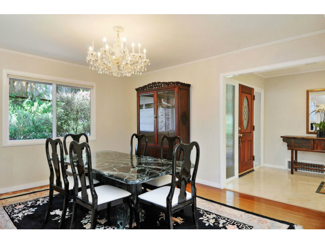 6 Spring Valley Lane Millbrae, CA 94030 - Photo 7 of 25 a view of a dining room with furniture and chandelier