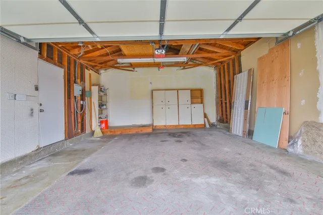 a view of a room with wooden walls