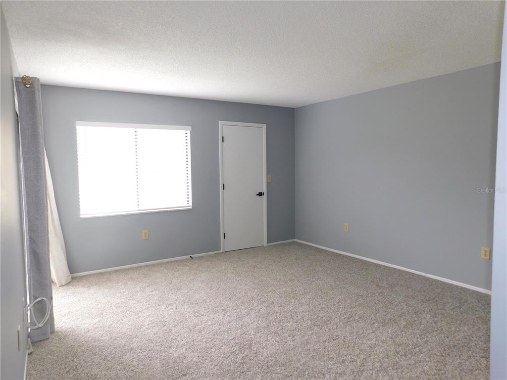 218 Caryl Way Oldsmar, FL 34677 - Photo 12 of 29 a view of an empty room with a window