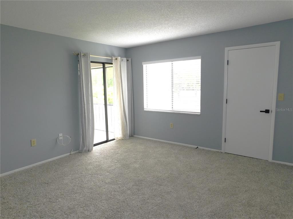 218 Caryl Way Oldsmar, FL 34677 - Photo 13 of 29 an empty room with windows