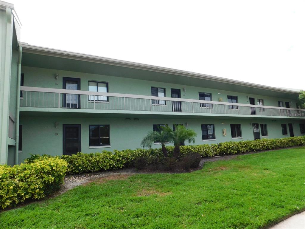218 Caryl Way Oldsmar, FL 34677 - Photo 2 of 29 a front view of a house with garden