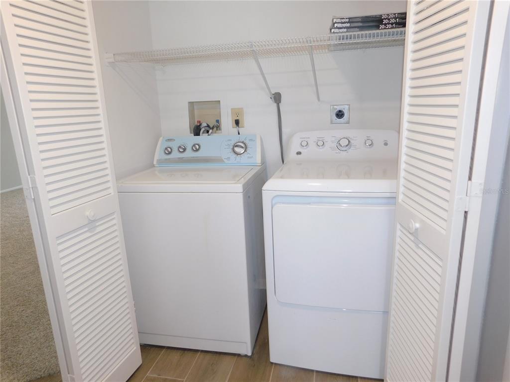218 Caryl Way Oldsmar, FL 34677 - Photo 22 of 29 a utility room with dryer and washer