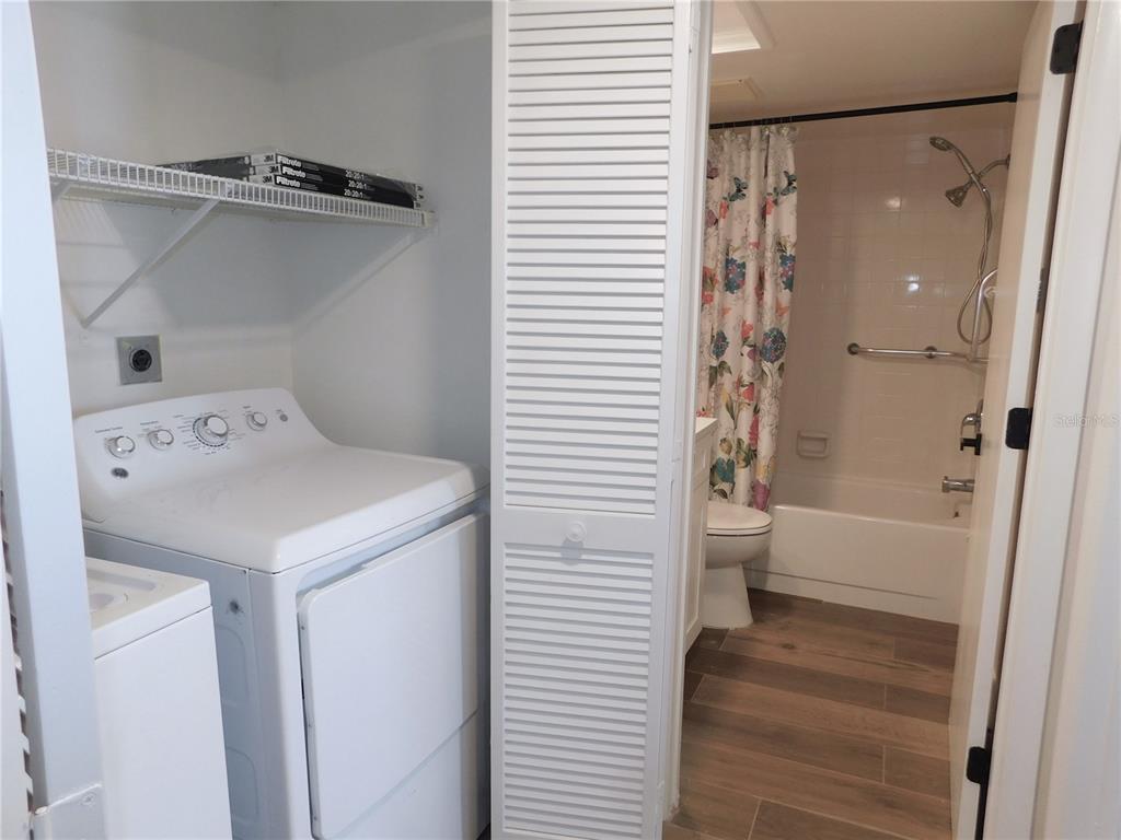 218 Caryl Way Oldsmar, FL 34677 - Photo 23 of 29 a bathroom with a sink a toilet and shower