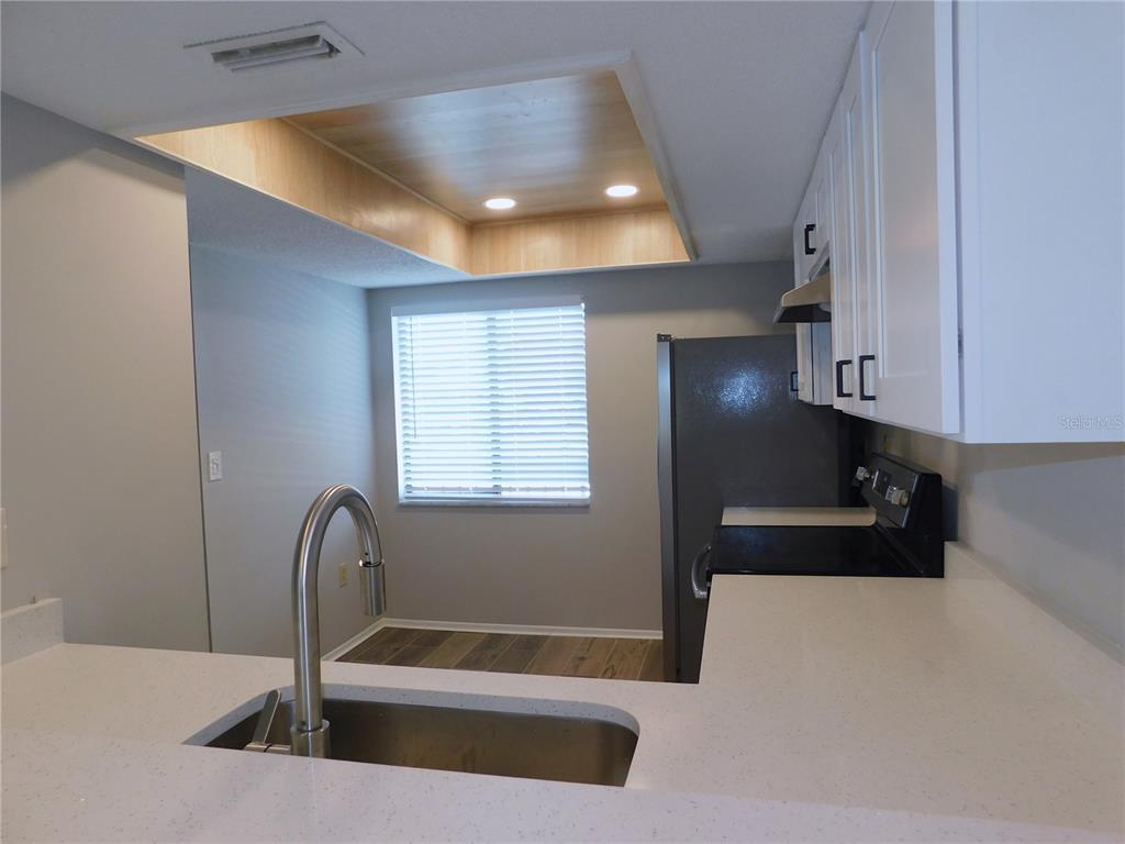 218 Caryl Way Oldsmar, FL 34677 - Photo 8 of 29 a bathroom with a sink and a bathtub