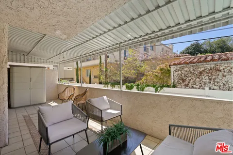 a outdoor living space with furniture