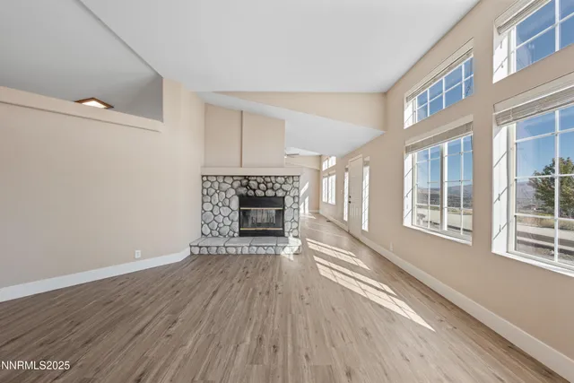 a bathroom with a granite countertop tub shower and sink