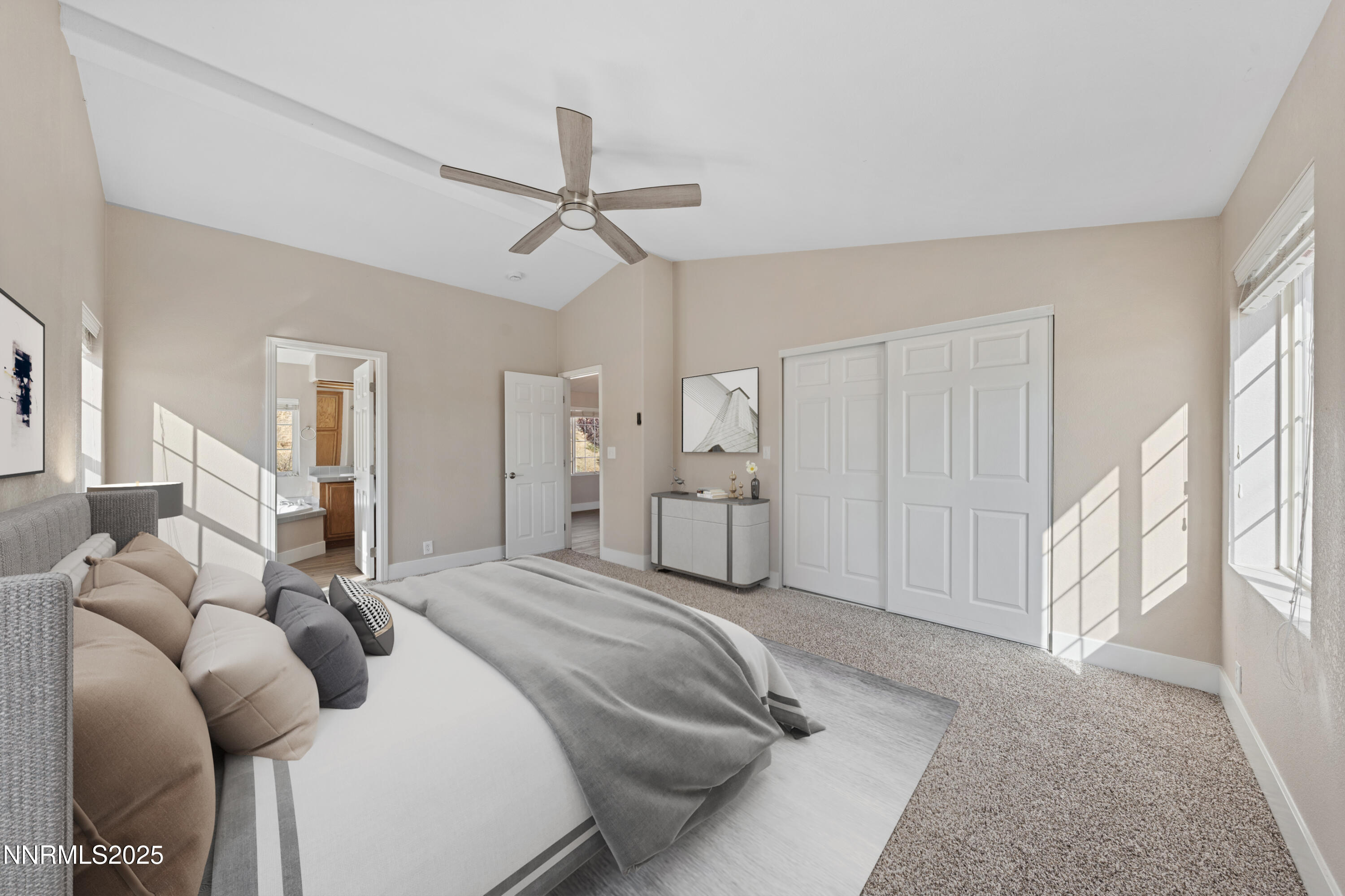 15190 North Red Rock Road Reno, NV 89508 - Photo 32 of 55 a bedroom with a bed and ceiling fan