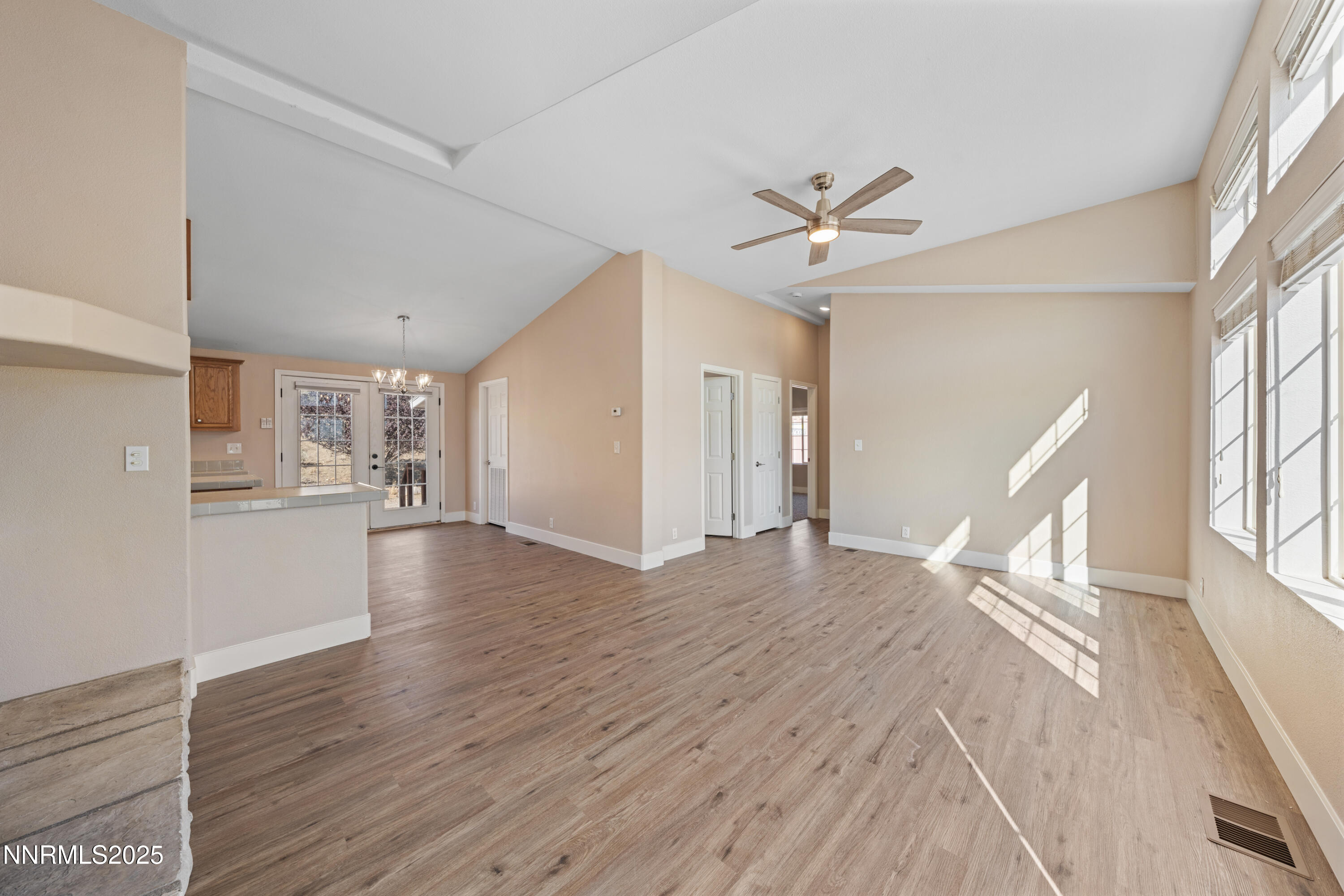 15190 North Red Rock Road Reno, NV 89508 - Photo 37 of 55 a view of an empty room with window and wooden floor