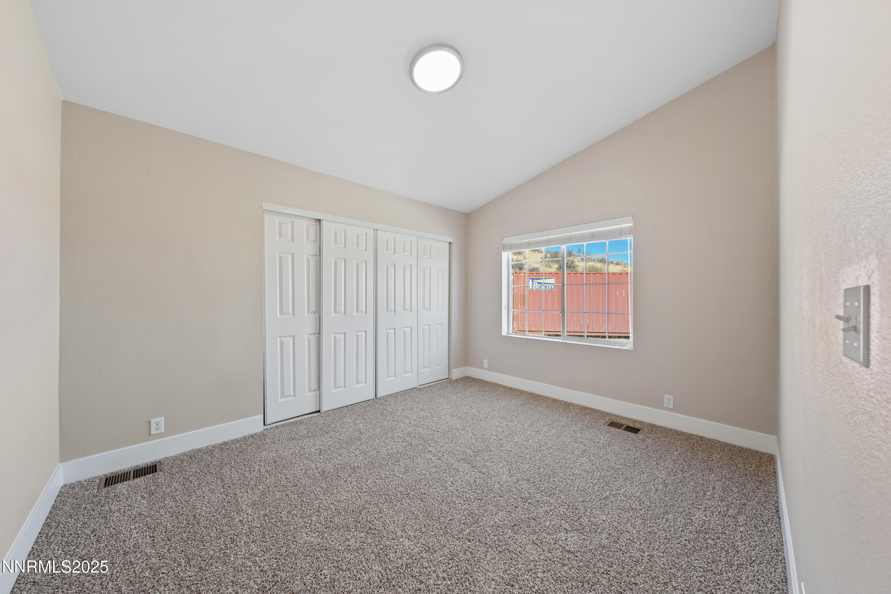 15190 North Red Rock Road Reno, NV 89508 - Photo 42 of 55 an empty room with windows
