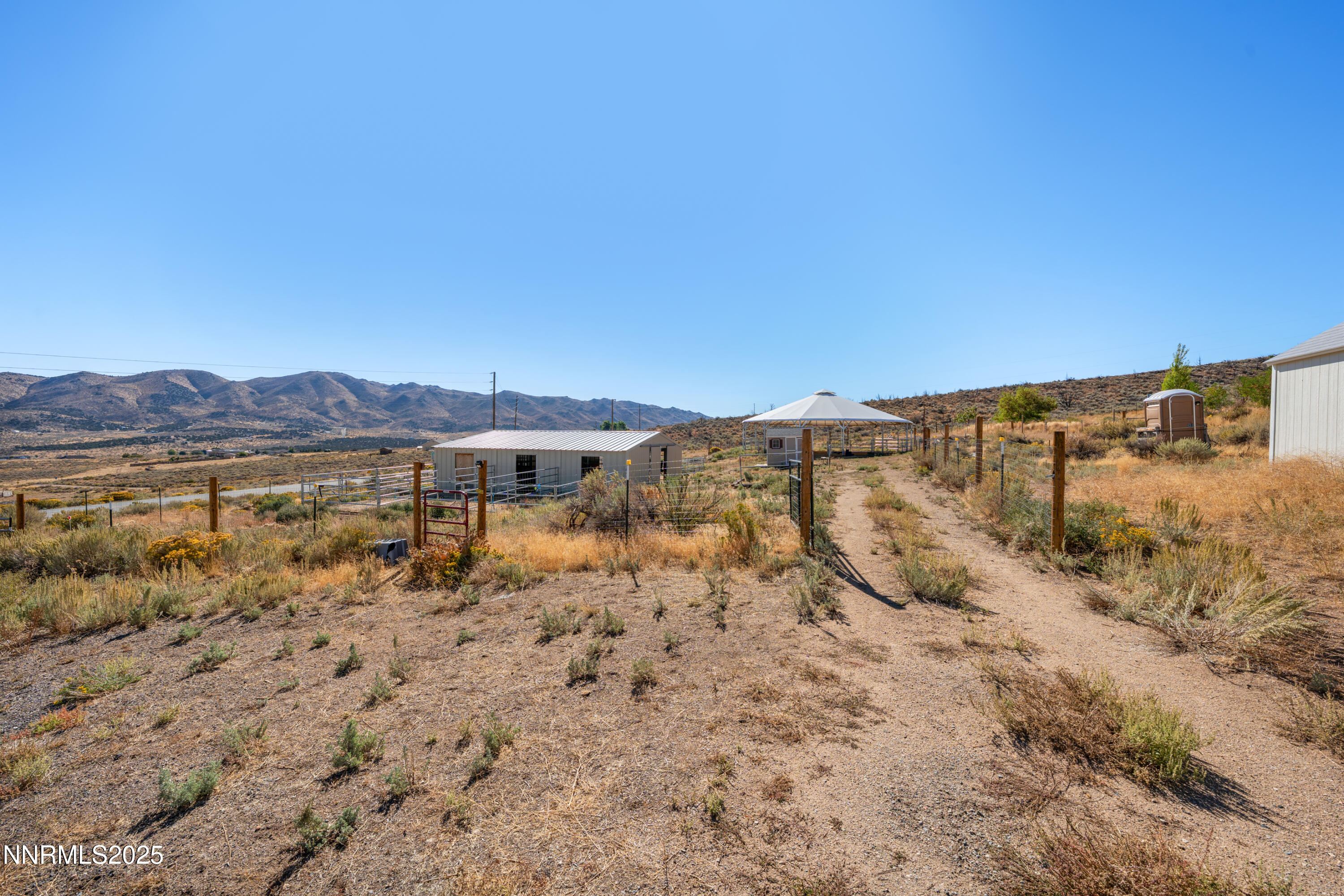 15190 North Red Rock Road Reno, NV 89508 - Photo 9 of 55 a view of a large body of water with a mountain in the background