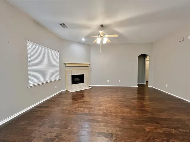 a kitchen with sink stove and refrigerator