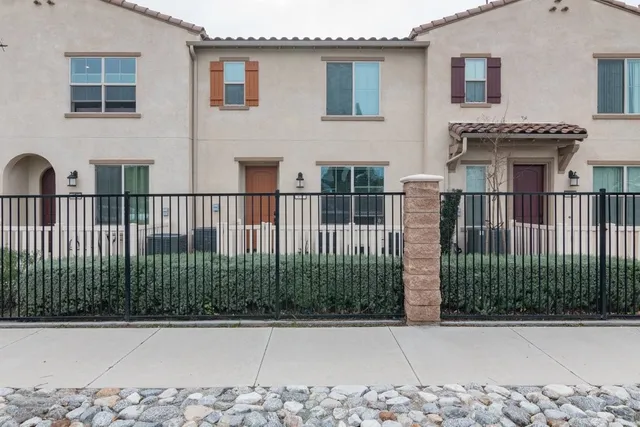 a view of a house with a small garden