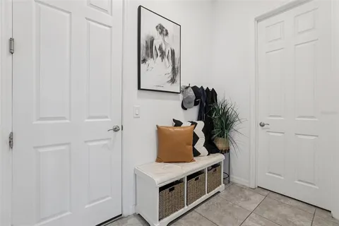 a bathroom with a sink double vanity granite and a mirror