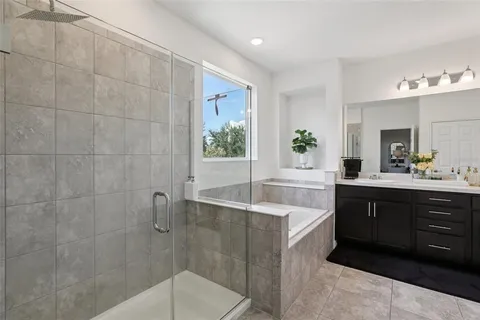 a bedroom with a bed and dresser