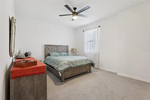 a view of a patio with couches and potted plant