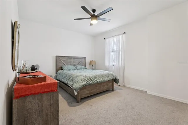a view of a patio with couches and potted plant