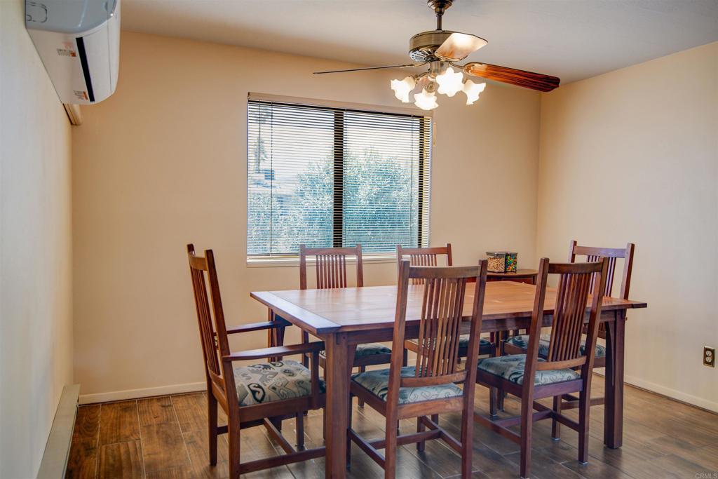 3456 El Tejon Road Borrego Springs, CA 92004 - Photo 3 of 17 a view of a dining room with furniture window and wooden floor