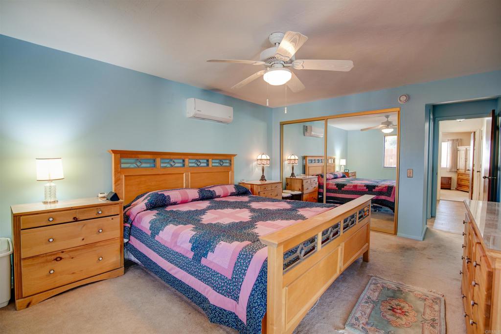 3456 El Tejon Road Borrego Springs, CA 92004 - Photo 7 of 17 a bed room with a bed and a chandelier