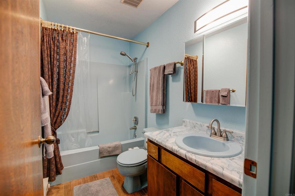 3456 El Tejon Road Borrego Springs, CA 92004 - Photo 9 of 17 a bathroom with a sink toilet and shower