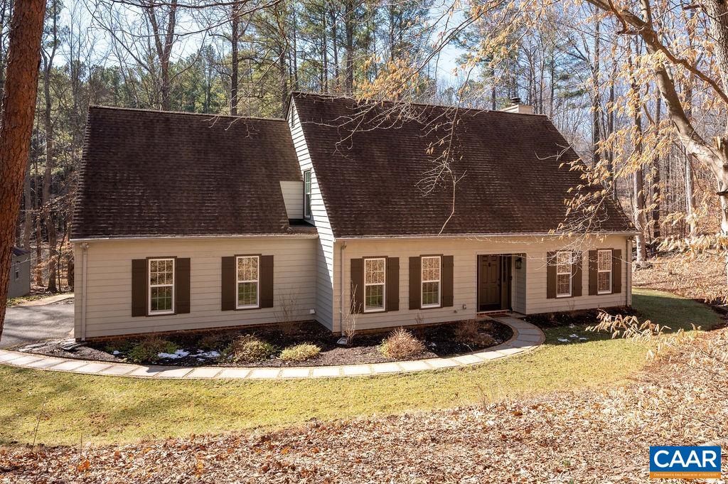 a view of a house with snow on the side of the house