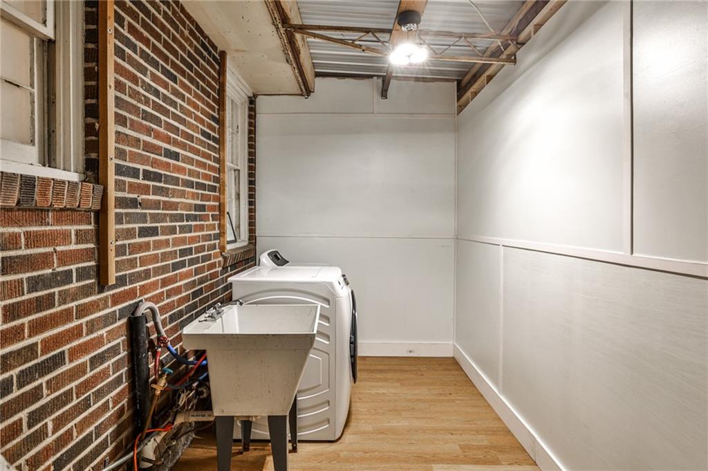 878 Scott Circle Decatur, GA 30033 - Photo 18 of 30 a view of a hallway with wooden floor