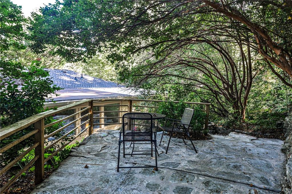 878 Scott Circle Decatur, GA 30033 - Photo 28 of 30 a patio with table and chairs and potted plants