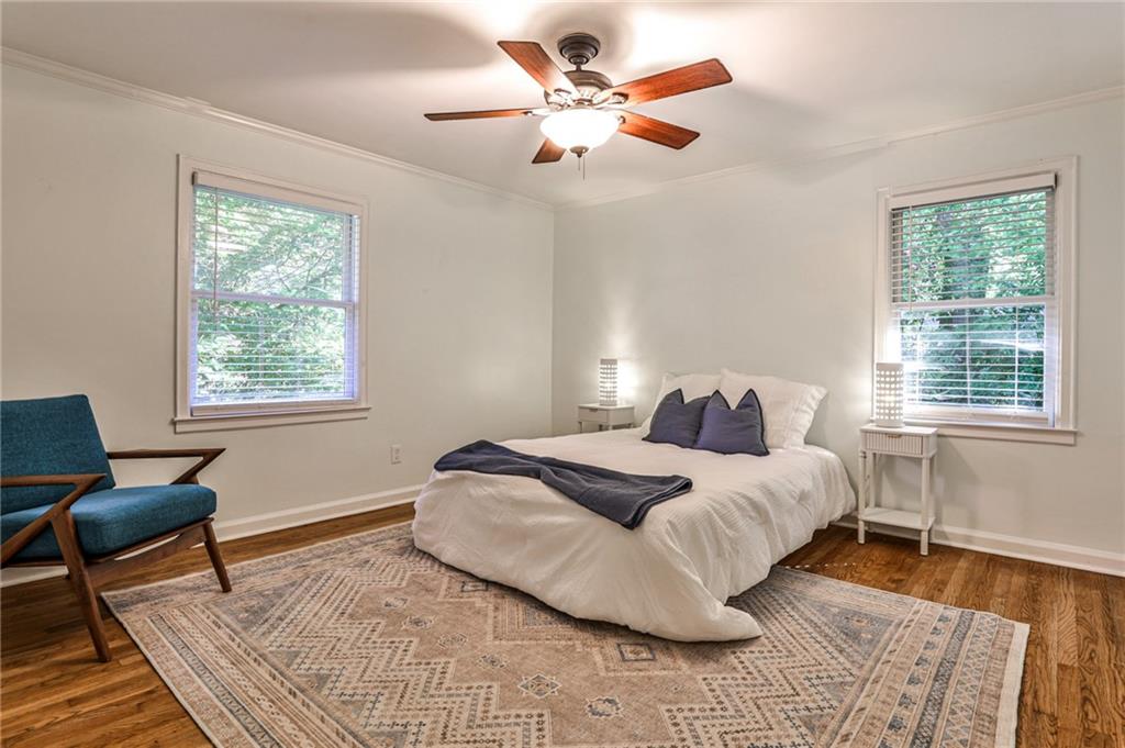 878 Scott Circle Decatur, GA 30033 - Photo 8 of 30 a spacious bedroom with a bed and a window