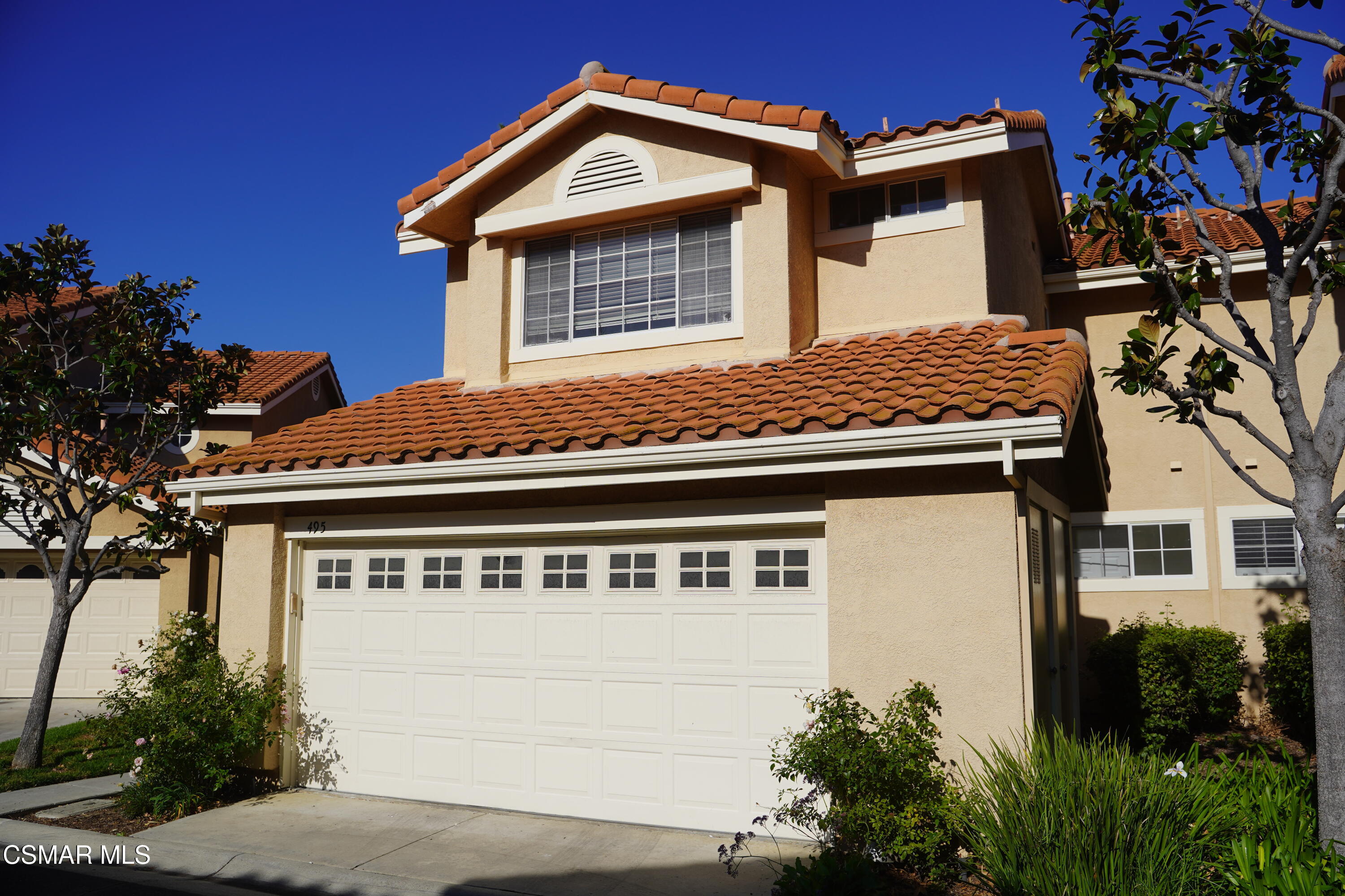 495 Novara Way Oak Park, CA 91377 - Photo 1 of 26 a view of a house with a garage