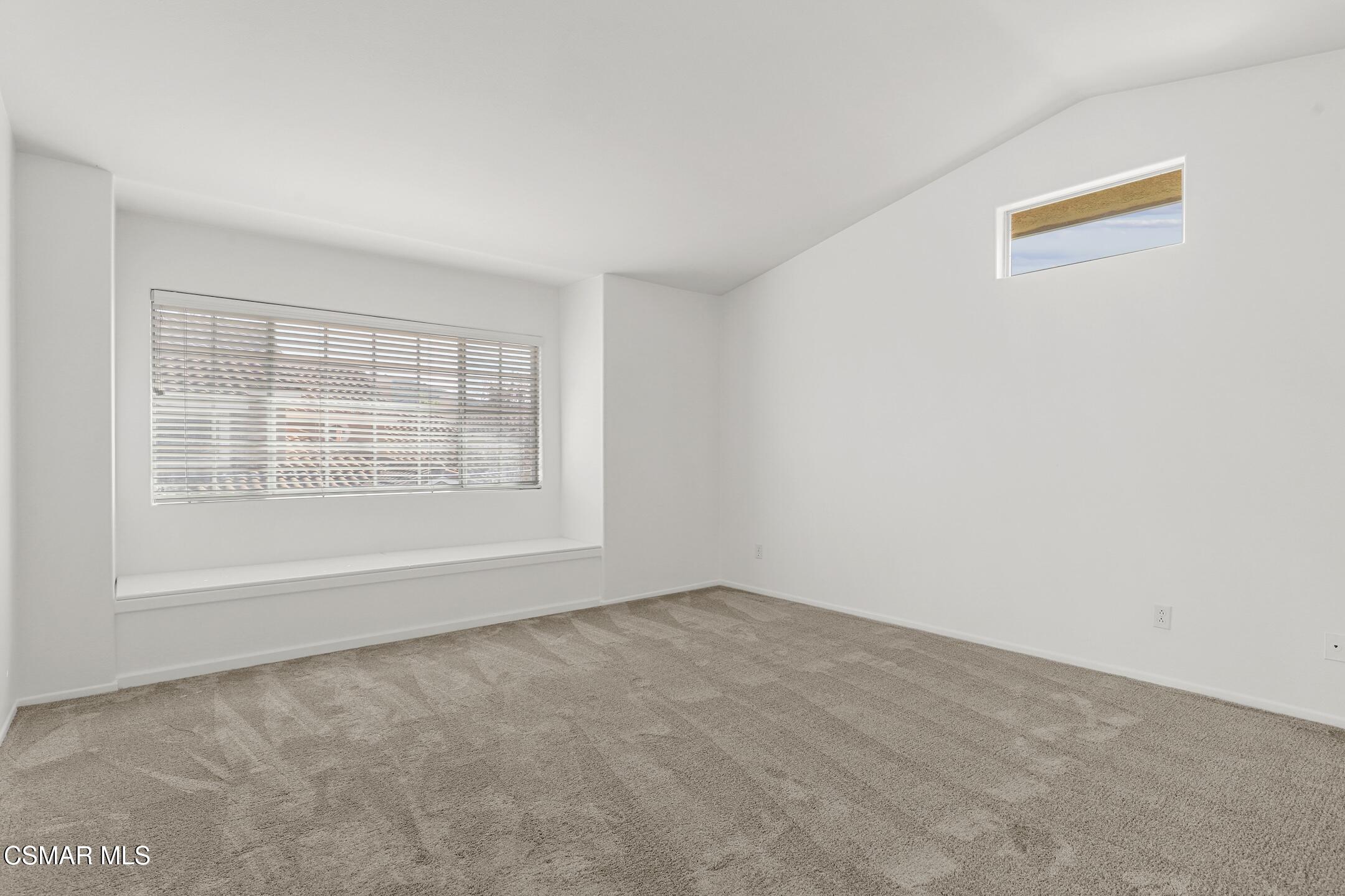 495 Novara Way Oak Park, CA 91377 - Photo 15 of 26 a view of an empty room with a window