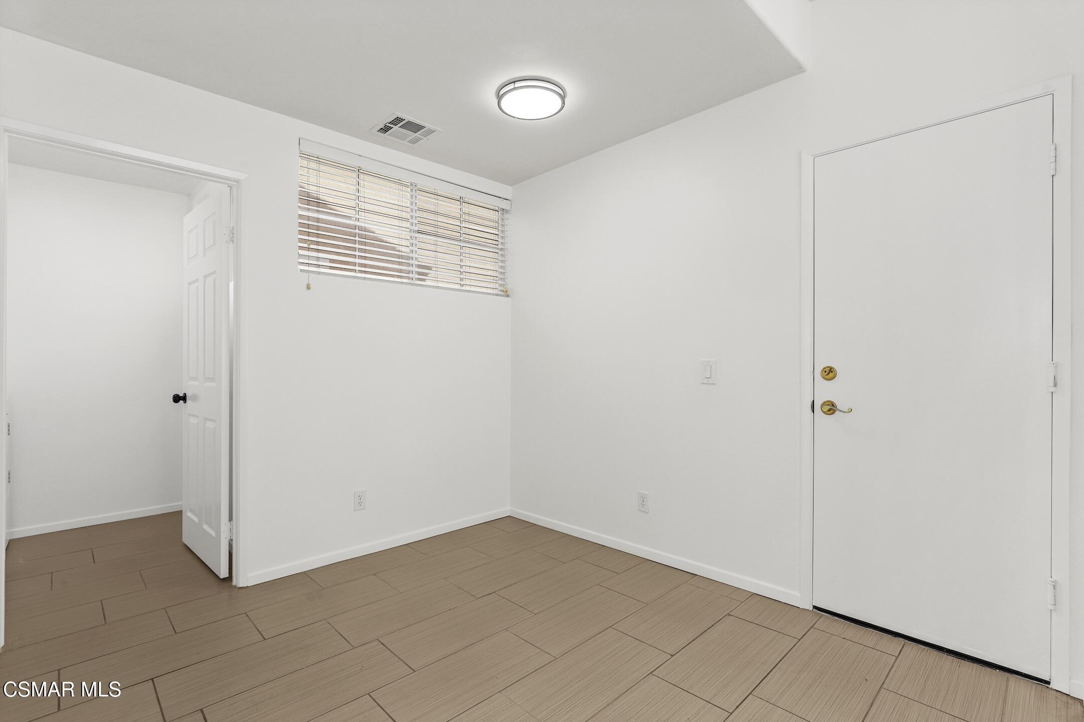 495 Novara Way Oak Park, CA 91377 - Photo 9 of 26 a view of a room with an empty space