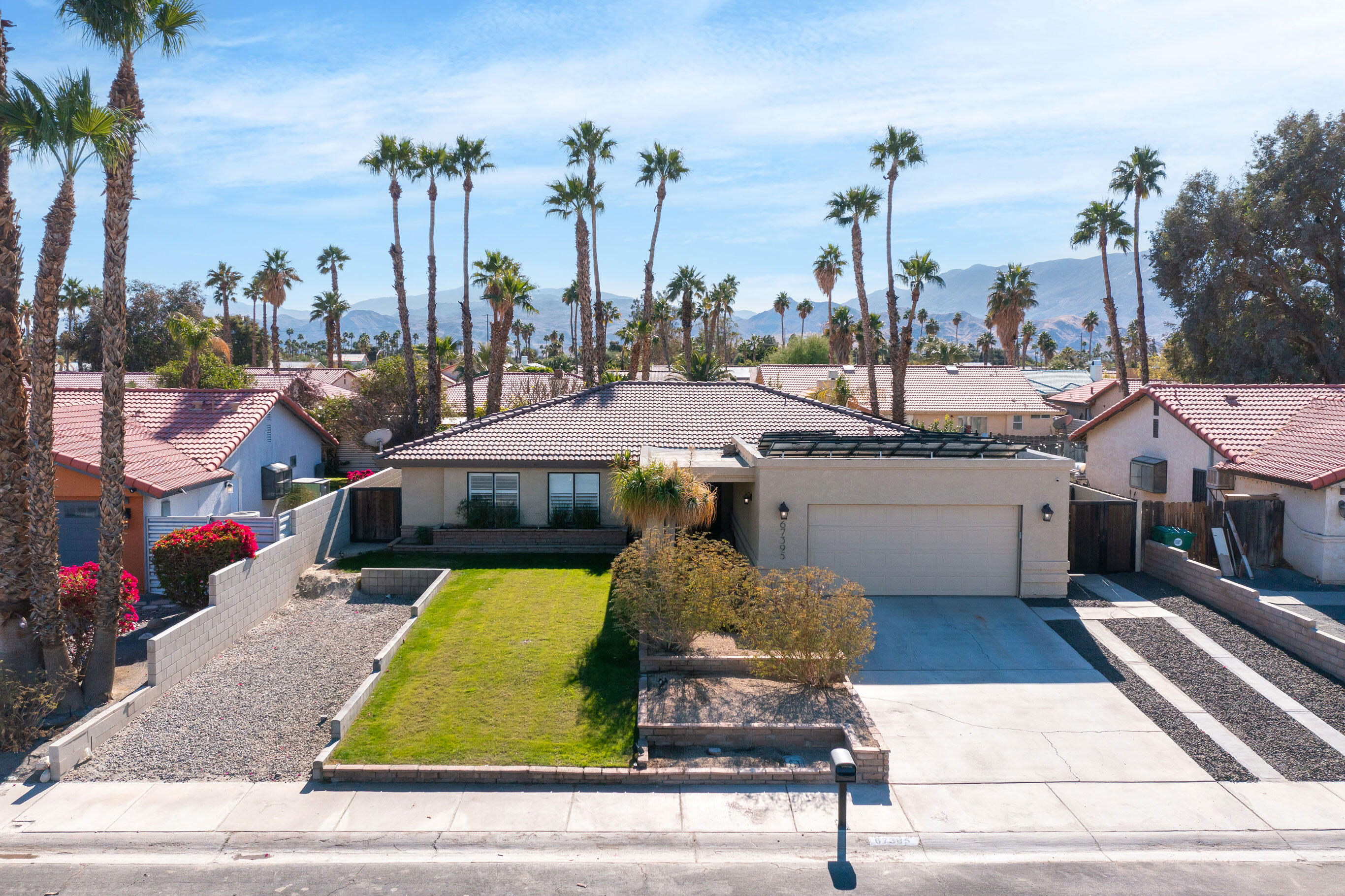 67395 Rango Road Cathedral City, CA 92234 - Photo 1 of 36 a view of a patio with swimming pool