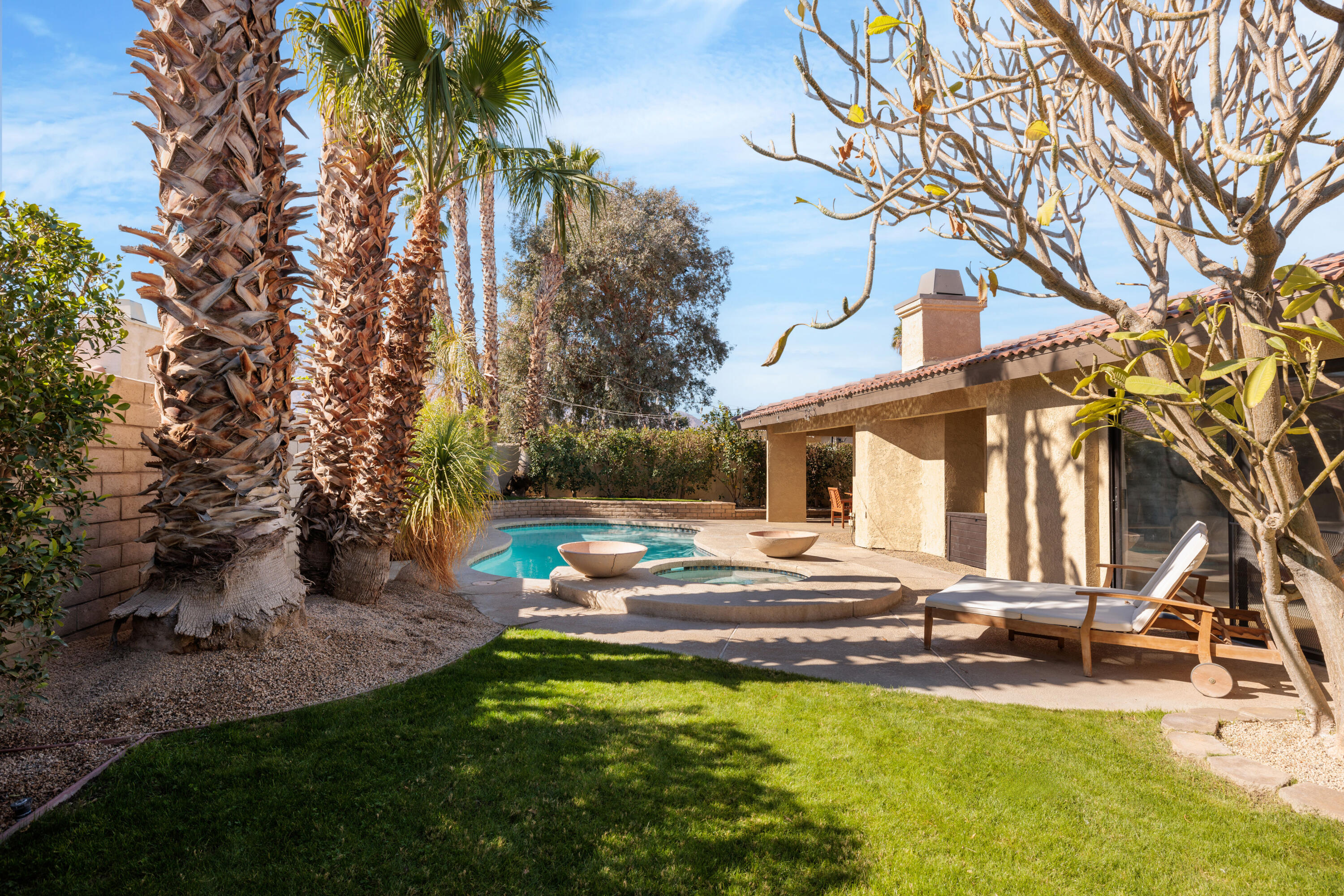 67395 Rango Road Cathedral City, CA 92234 - Photo 2 of 36 a view of a house with swimming pool and sitting area