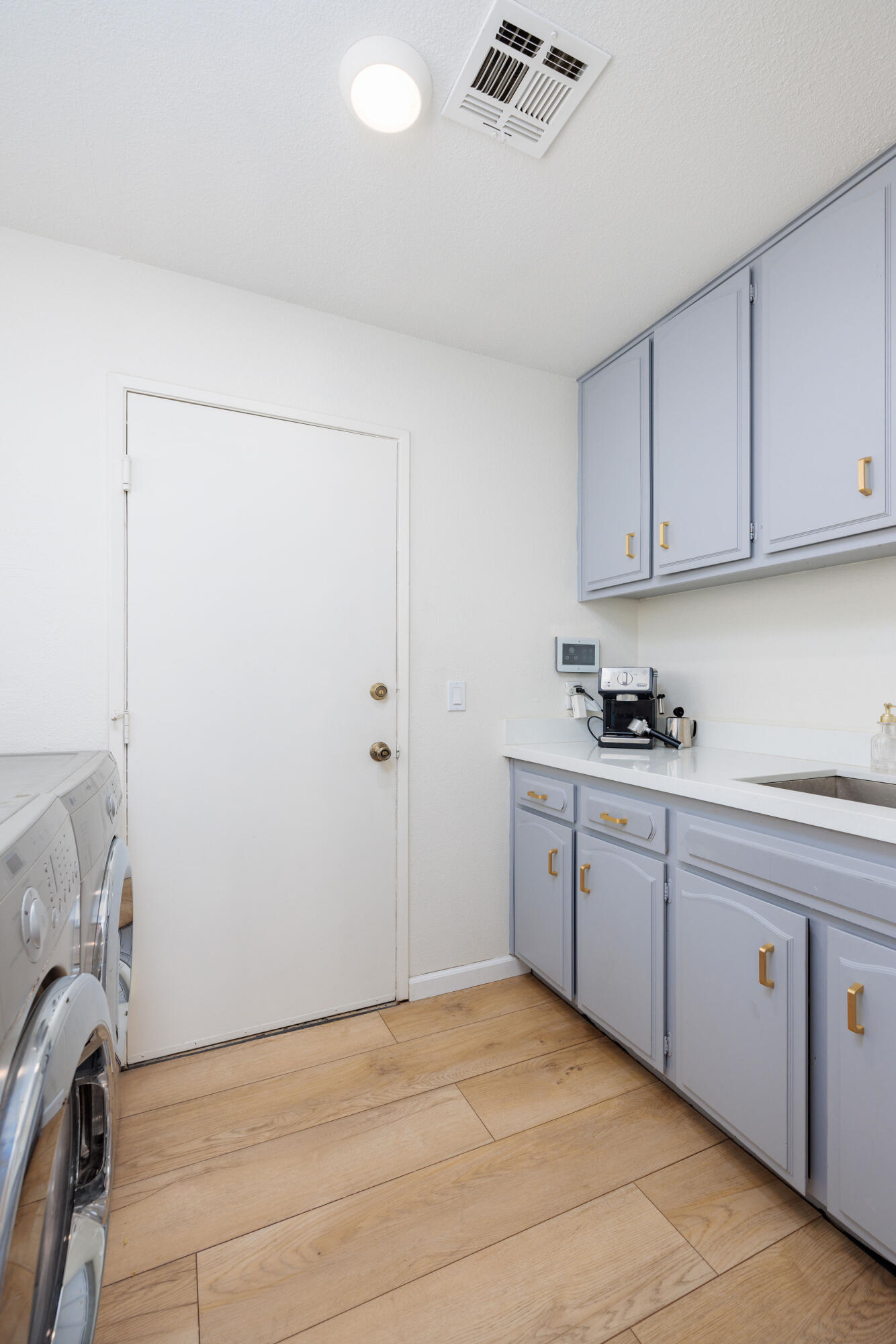 67395 Rango Road Cathedral City, CA 92234 - Photo 22 of 36 a room with a sink and cabinets